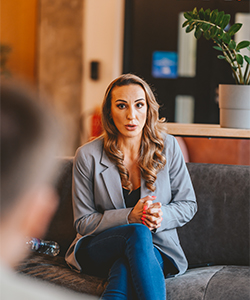 Francesca talking with client